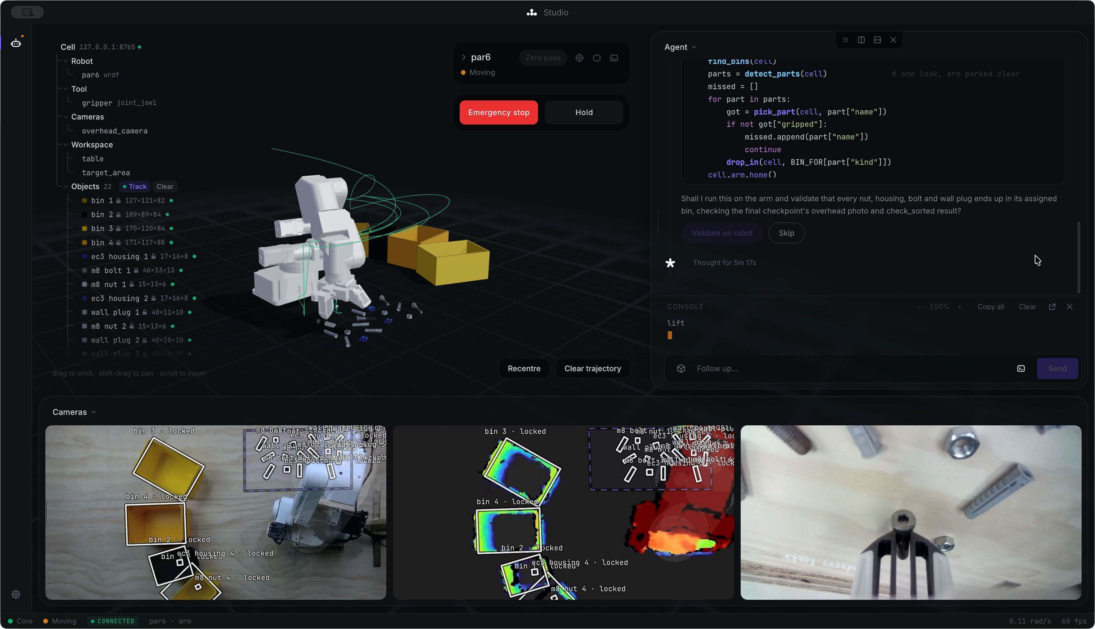 Ohm Lab Studio: the cell model, a live visualisation of the arm, camera feeds with detected parts, and the agent panel